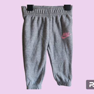 NIKE girl sweatpants sweats athleisure pants in gray and pink size 12M.